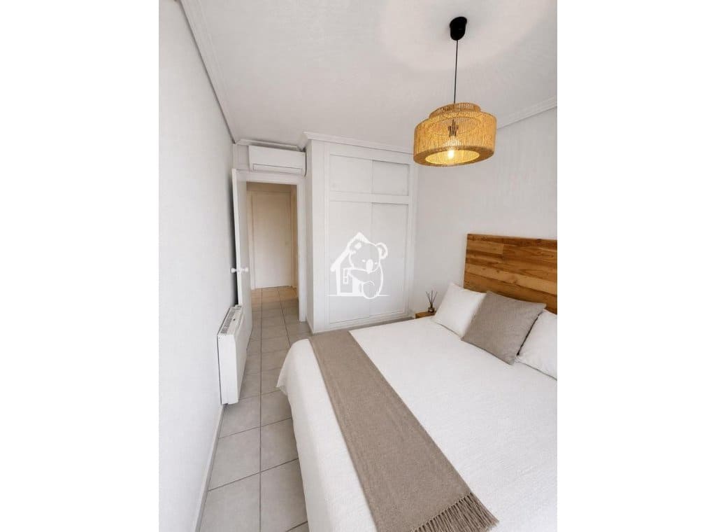 2 soveværelse Strandlejlighed til leje i Orihuela Costa med swimmingpool garage - € 1.450 (Ref: 9944989)