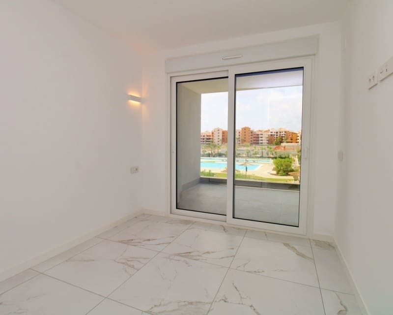 2 chambre Appartement à vendre à Punta Prima avec piscine garage - 359 900 € (Ref: 10045937)
