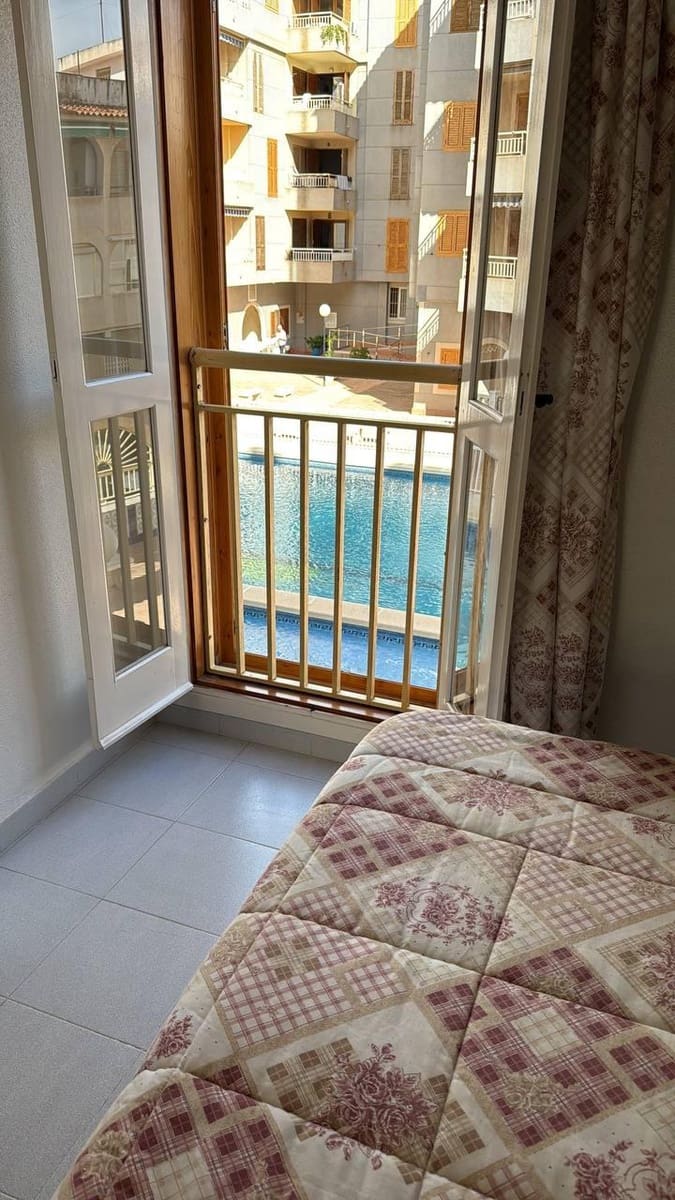2 sypialnia Apartament na sprzedaż w Torrevieja z basenem - 134 000 € (Ref: 9403203)