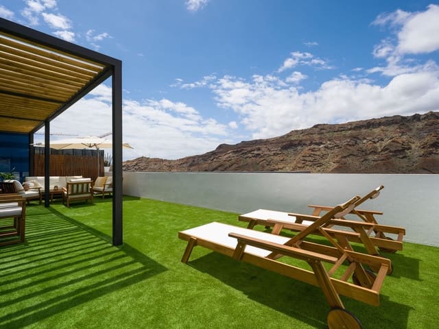 2 sypialnia Apartament do wynajęcia w Puerto Rico, Mogán z basenem garażem - 2 200 € (Ref: 10013927)