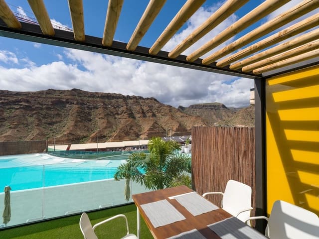 1 sypialnia Apartament do wynajęcia w Puerto Rico, Mogán z basenem garażem - 1 600 € (Ref: 10013935)