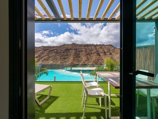 1 sypialnia Apartament do wynajęcia w Puerto Rico, Mogán z basenem garażem - 1 600 € (Ref: 10013935)