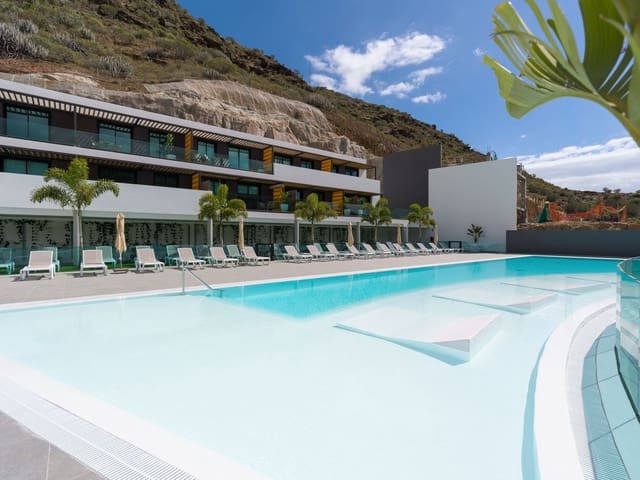 1 sypialnia Apartament do wynajęcia w Puerto Rico, Mogán z basenem garażem - 1 600 € (Ref: 10013935)