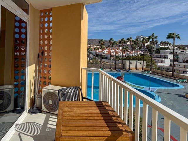 Apartamento de 2 habitaciones en Playa de las Americas, Arona en venta con piscina garaje - 395.000 € (Ref: 10049326)