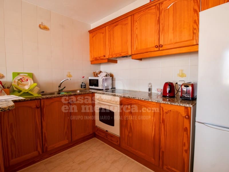 3 quarto Apartamento para venda em Es Castell com piscina - 330 000 € (Ref: 9141563)
