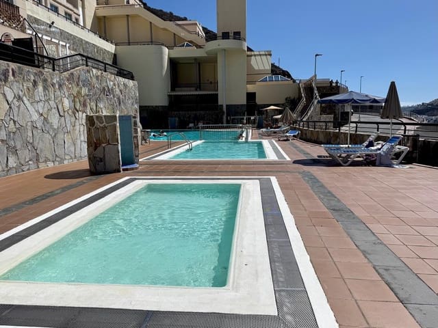 2 slaapkamer Bungalow te huur in Puerto Rico, Mogán met zwembad garage - € 1.500 (Ref: 9193749)