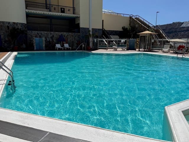 2 slaapkamer Bungalow te huur in Puerto Rico, Mogán met zwembad garage - € 1.500 (Ref: 9193749)