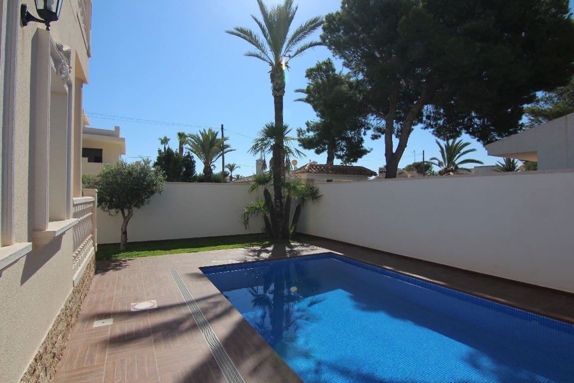 5 soveværelse Villa til salg i Cabo Roig med swimmingpool garage - € 910.000 (Ref: 7937576)