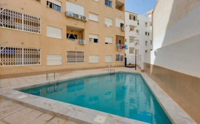 Apartamento de 2 habitaciones en Playa de los Locos, Torrevieja en venta con piscina garaje - 140.000 € (Ref: 10081138)