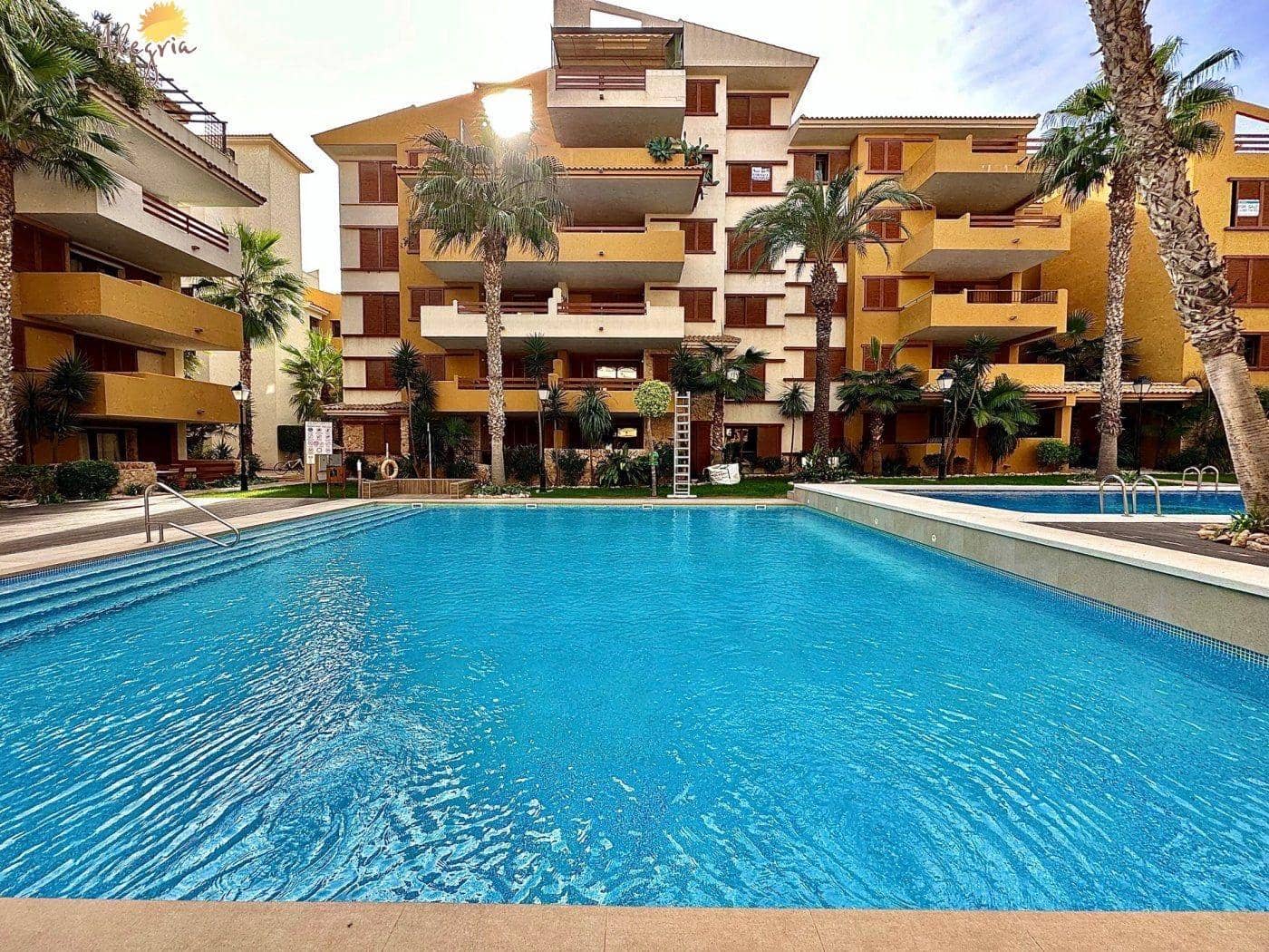 3 sypialnia Apartament na sprzedaż w Punta Prima z basenem garażem - 355 000 € (Ref: 8566471)