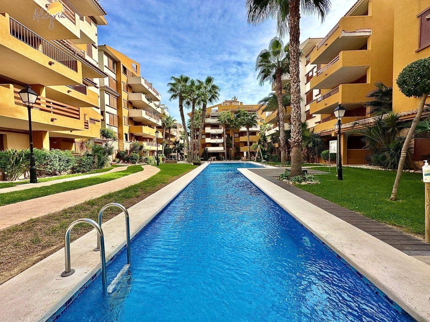 3 sypialnia Apartament na sprzedaż w Punta Prima z basenem garażem - 355 000 € (Ref: 8566471)