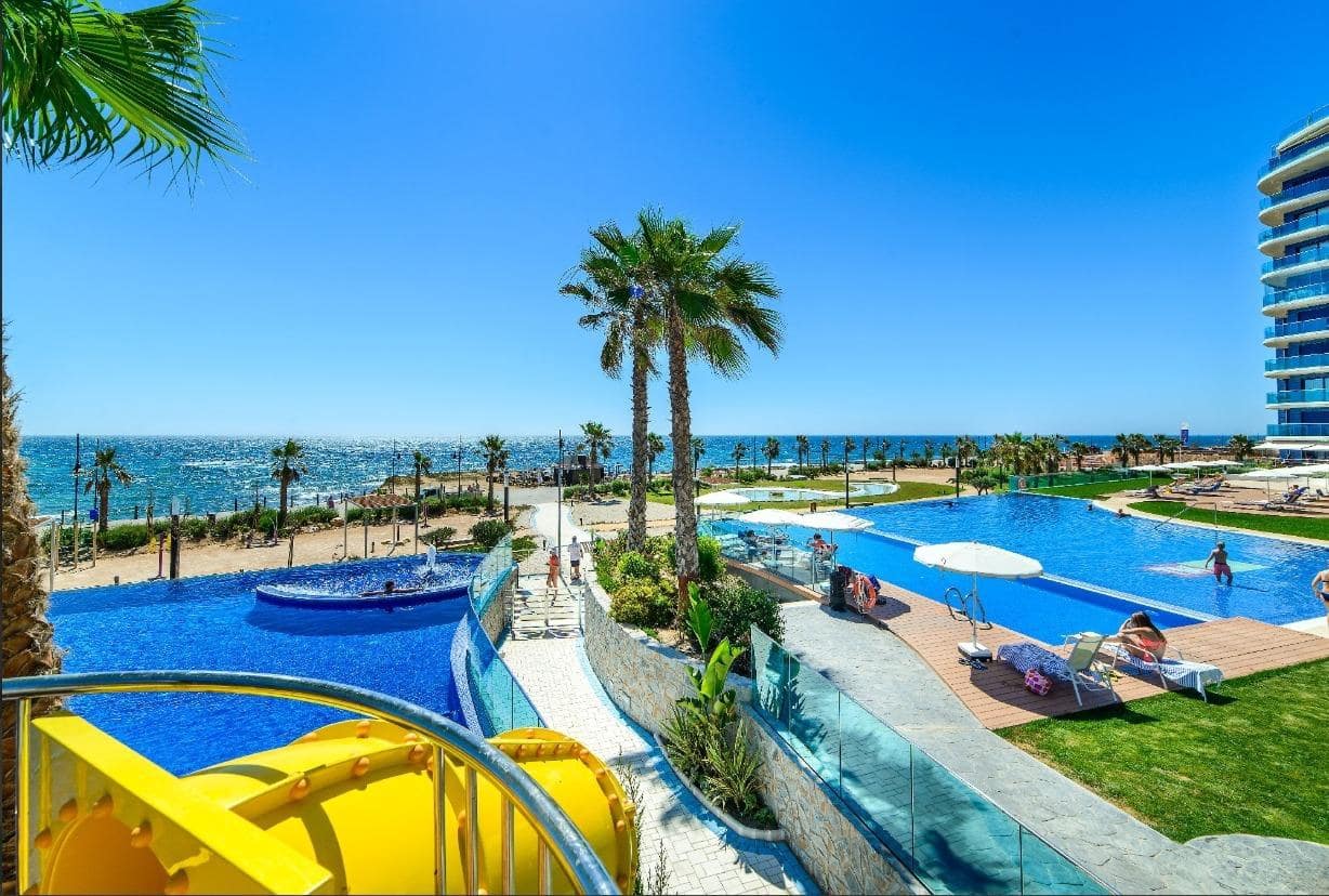 Apartamento de 2 habitaciones en Punta Prima en venta con piscina garaje - 389.000 € (Ref: 8857402)