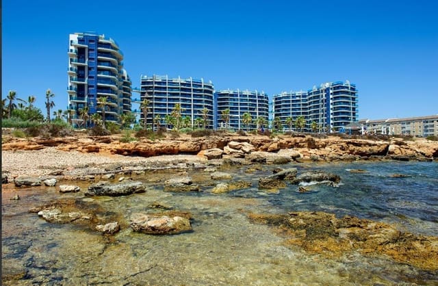 Apartamento de 2 habitaciones en Punta Prima, Torrevieja en venta con piscina garaje - 389.000 € (Ref: 8857402)