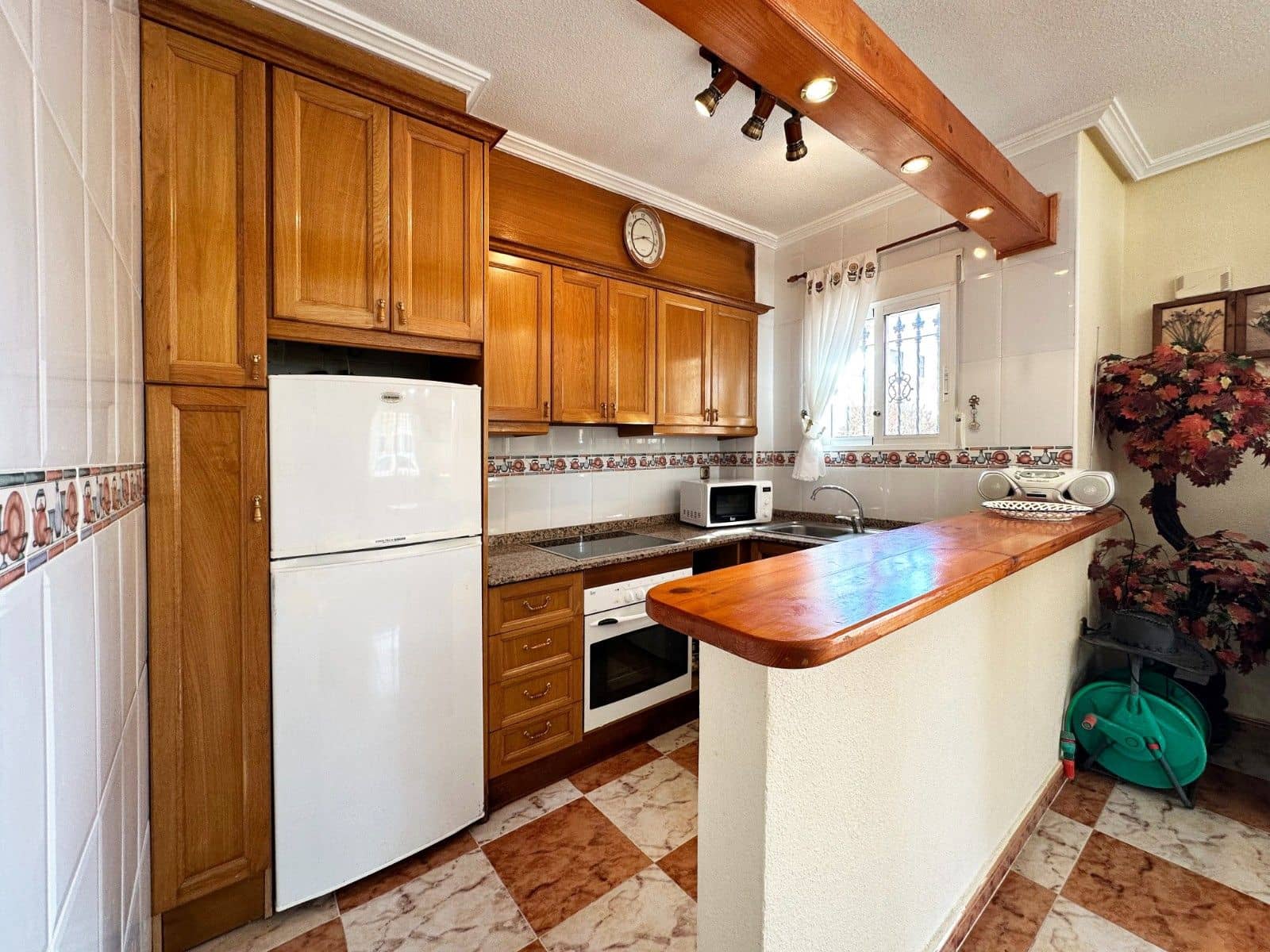 2 soveværelse Rækkehus til salg i Orihuela Costa med swimmingpool - € 235.000 (Ref: 9799493)