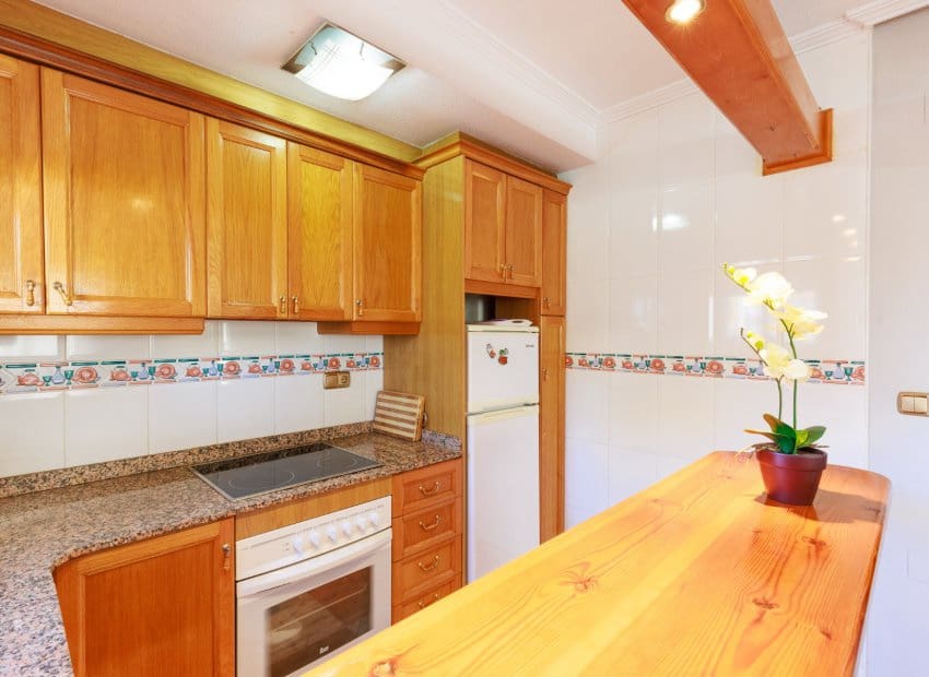 2 slaapkamer Rijtjeshuis te koop in Villamartin met zwembad garage - € 210.000 (Ref: 10173921)