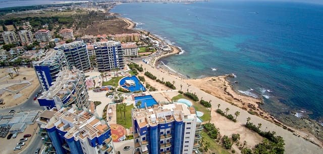 Apartamento de 2 habitaciones en Punta Prima, Orihuela en venta con piscina - 450.000 € (Ref: 9966114)