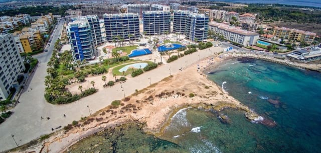 Apartamento de 2 habitaciones en Punta Prima, Orihuela en venta con piscina - 450.000 € (Ref: 9966114)