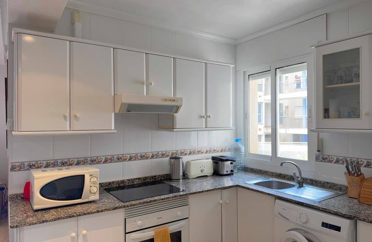 2 Zimmer Apartment zu verkaufen in Cabo Roig mit Pool Garage - 184.950 € (Ref: 10173994)