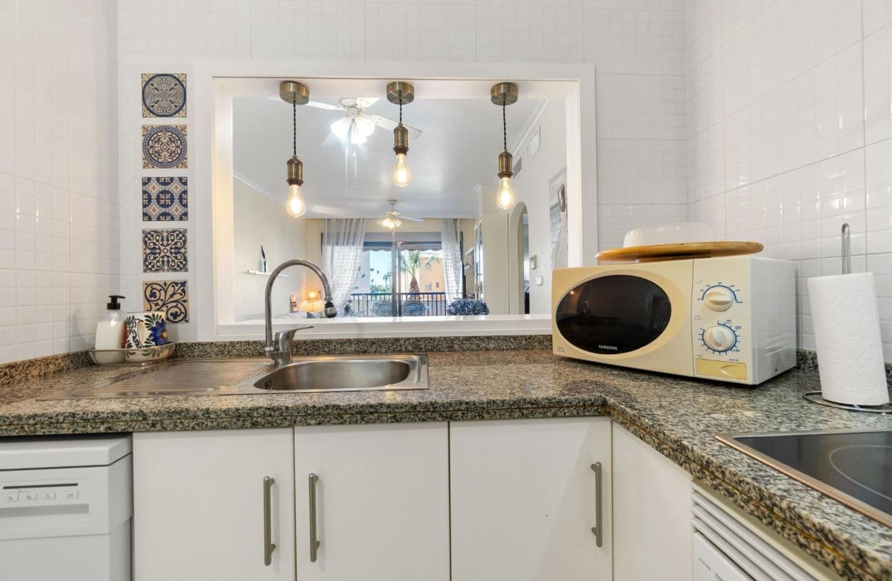 2 bedroom Beach Apartment for sale in Campoamor with pool garage - € 279,000 (Ref: 9432547)