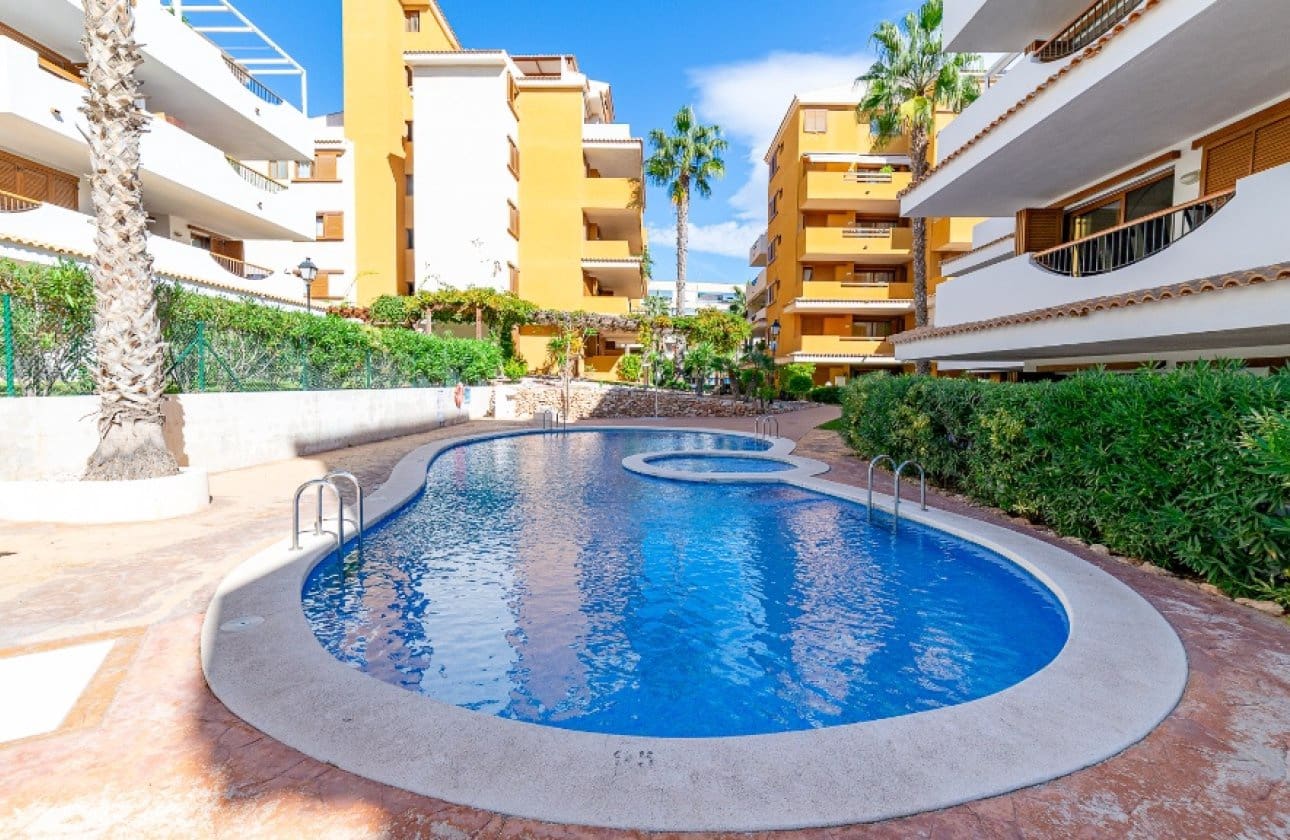 2 soverom Strandleiligheter til salgs i Orihuela Costa med svømmebasseng - € 260 000 (Ref: 9677900)