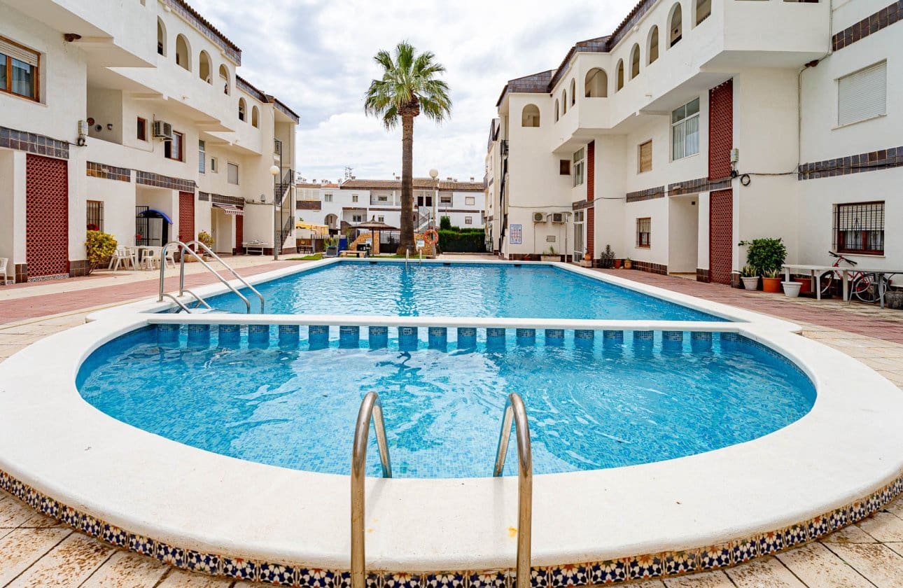 2 bedroom Beach Apartment for sale in Punta Prima with pool - € 170,000 (Ref: 9834260)