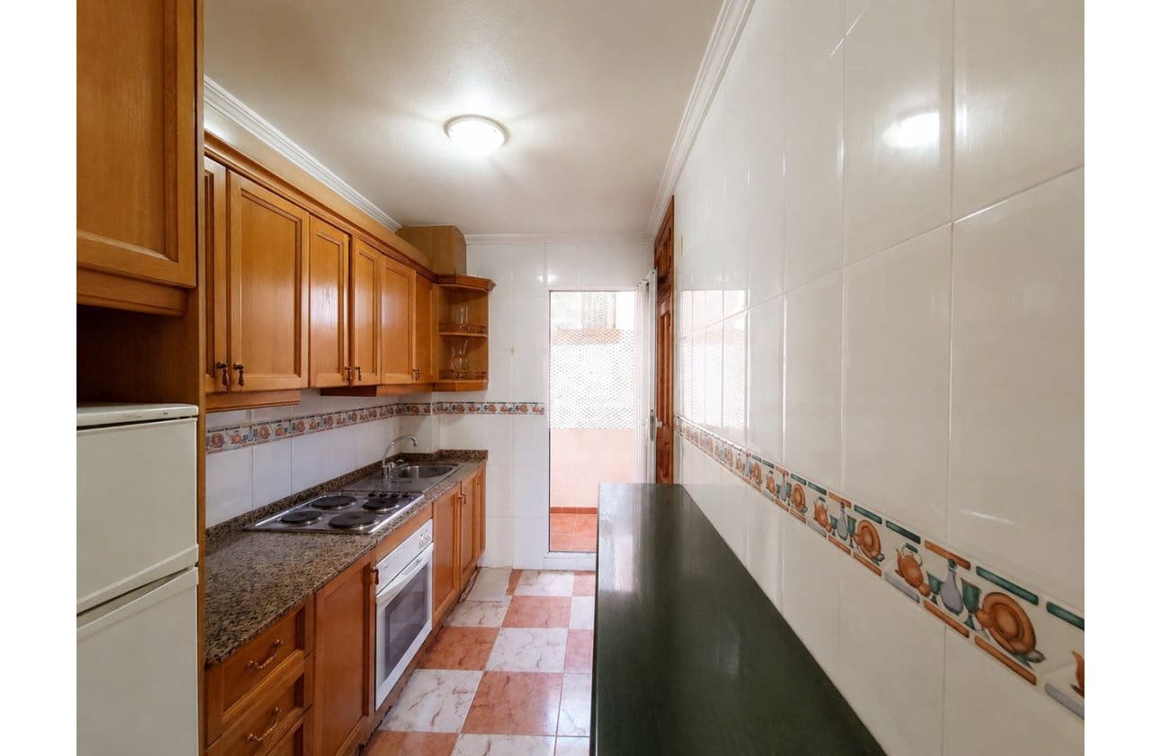 2 soveværelse Lejlighed til salg i Villamartin med swimmingpool - € 159.000 (Ref: 9948377)