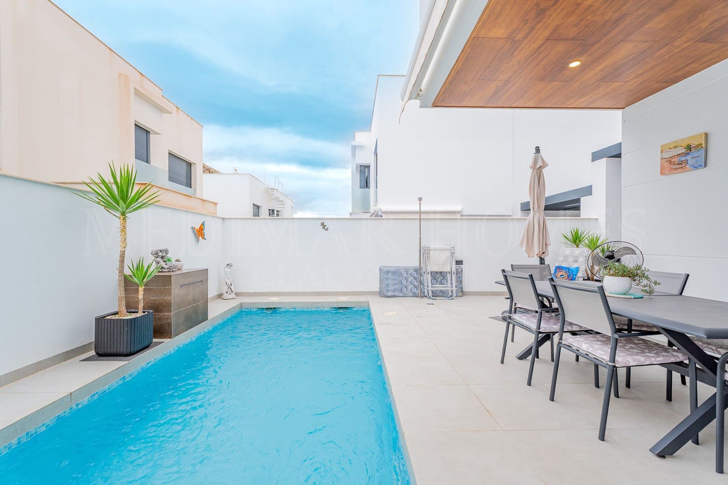 3 sypialnia Dom blizniak na sprzedaż w San Juan de los Terreros z basenem garażem - 299 999 € (Ref: 9307040)