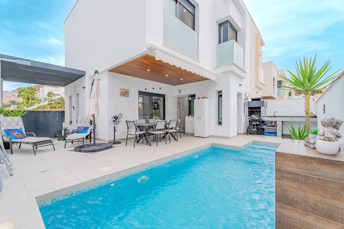 3 sypialnia Dom blizniak na sprzedaż w San Juan de los Terreros z basenem garażem - 299 999 € (Ref: 9307040)