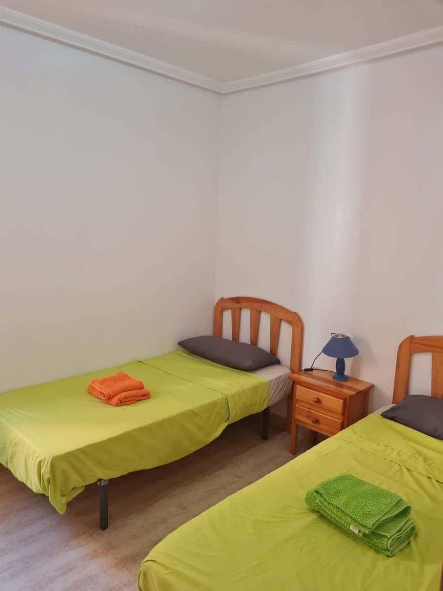 2 Zimmer Wohnung zu vermieten in Orihuela Costa mit Pool Garage - 950 € (Ref: 9721065)