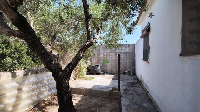 Chalet de 3 habitaciones en Oliva Playa, Oliva en venta con garaje - 170.000 € (Ref: 9980165)