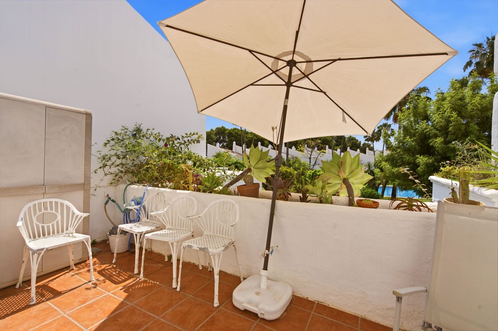 3 quarto Casa em Banda para venda em Estepona com piscina garagem - 550 000 € (Ref: 9924271)