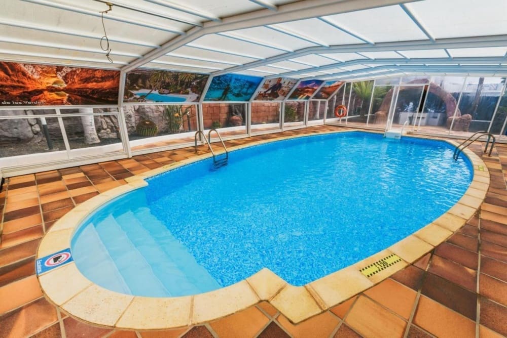 Chalet de 3 habitaciones en Playa Blanca en venta con piscina - 650.000 € (Ref: 9282145)