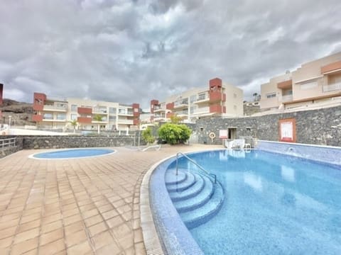 3 sypialnia Dom na sprzedaż w Santiago del Teide z basenem garażem - 595 000 € (Ref: 9460675)