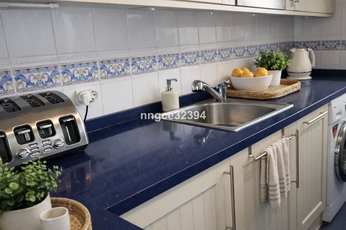 4 soveværelse Semi-Rækkehus til salg i Manilva med swimmingpool garage - € 549.900 (Ref: 9701542)