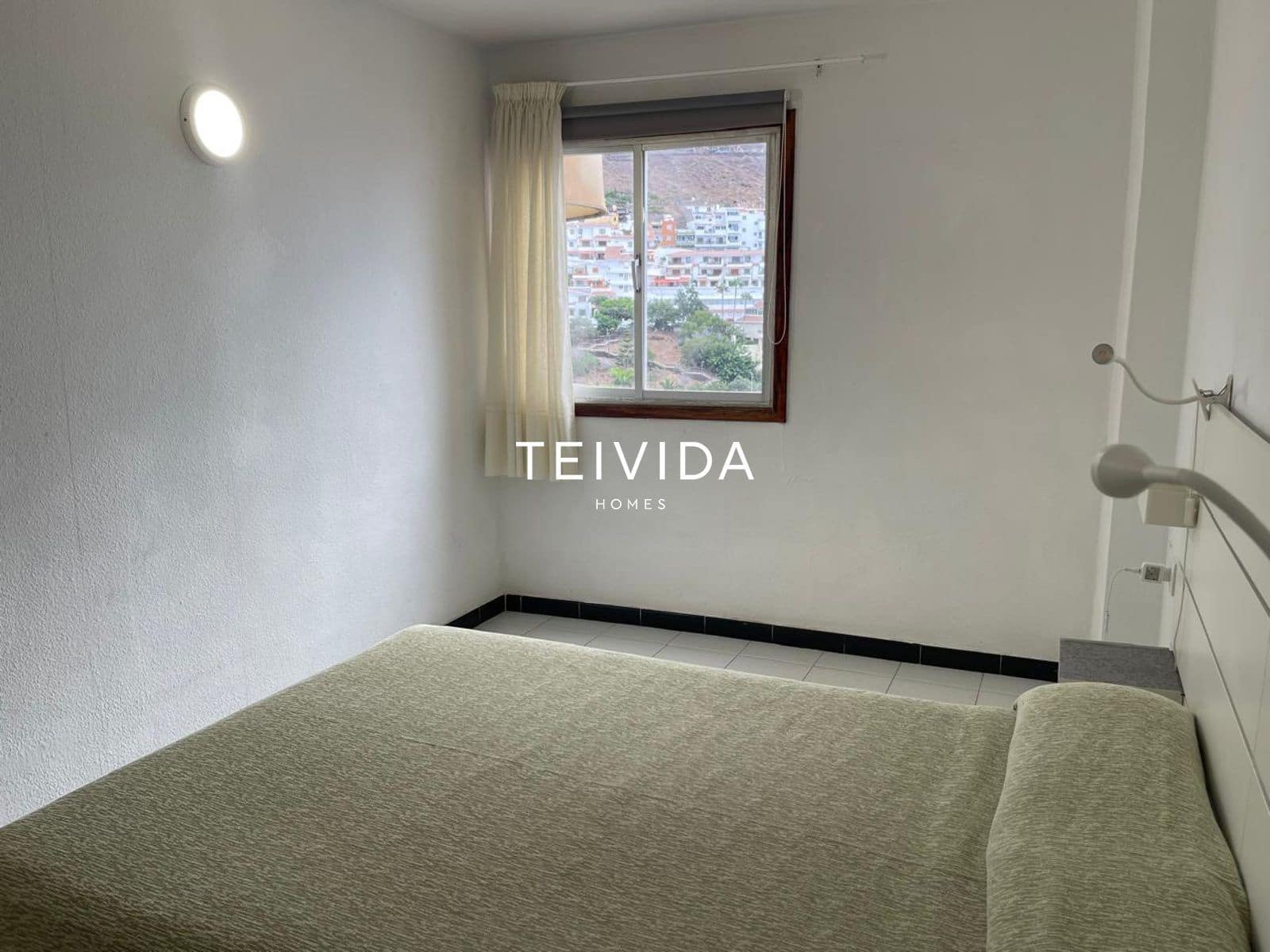 Piso de 1 habitación en Los Cristianos en venta con piscina garaje - 385.000 € (Ref: 10170391)