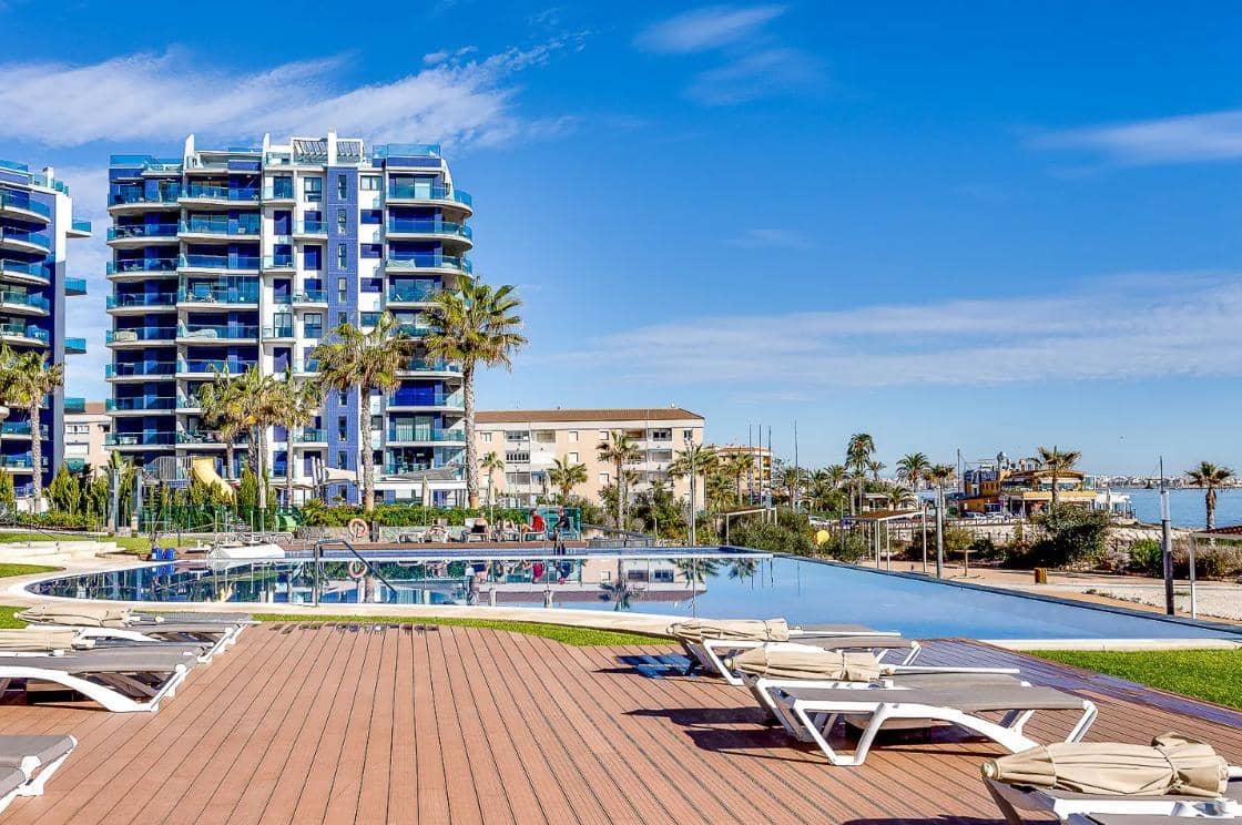 3 sypialnia Apartament na sprzedaż w Punta Prima z basenem garażem - 550 000 € (Ref: 9528317)