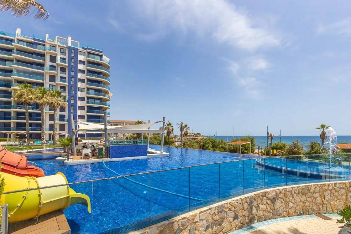 3 sypialnia Apartament na sprzedaż w Punta Prima z basenem garażem - 550 000 € (Ref: 9528317)