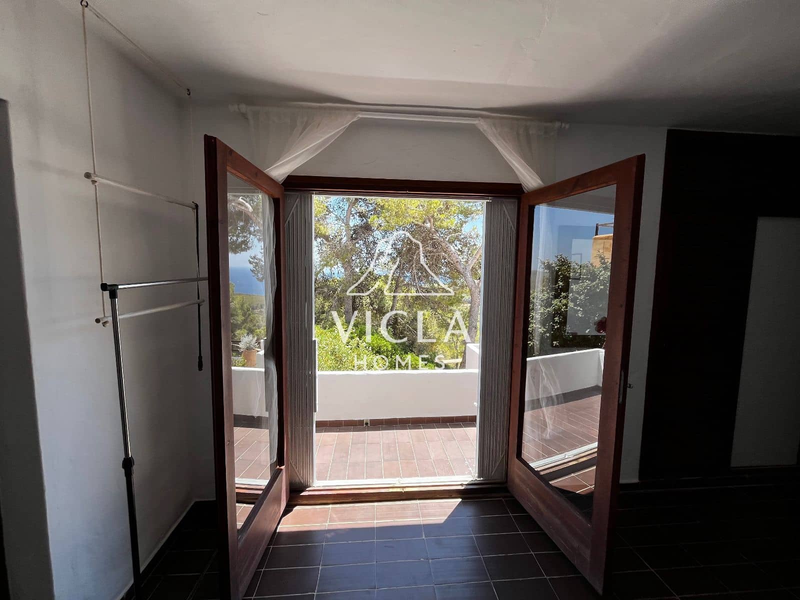 2 quarto Moradia para arrendar em Es Cubells com piscina garagem - 7 500 € (Ref: 10102981)