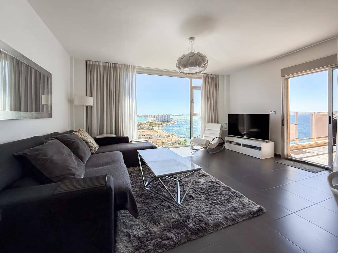 Piso de 3 habitaciones en La Manga del Mar Menor en venta con piscina garaje - 395.000 € (Ref: 10011794)