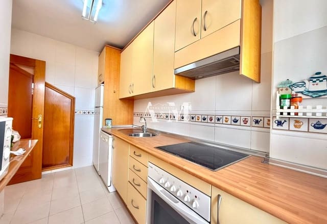Appartement de Plage de 2 chambres à louer à Dehesa de Campoamor, Orihuela avec piscine garage - 800 € (Ref: 10095378)