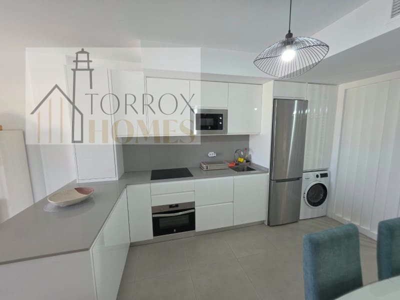 Piso de 2 habitaciones en Torrox-Costa en venta con piscina garaje - 395.000 € (Ref: 10166931)