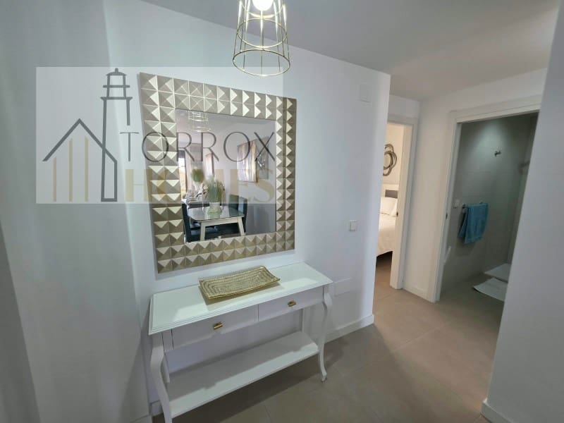 Piso de 2 habitaciones en Torrox-Costa en venta con piscina garaje - 395.000 € (Ref: 10166931)