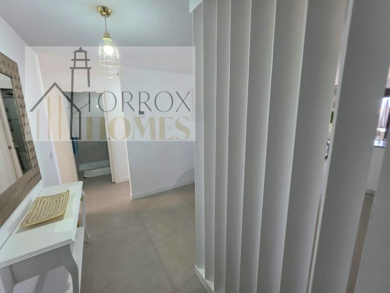 Piso de 2 habitaciones en Torrox-Costa en venta con piscina garaje - 395.000 € (Ref: 10166931)