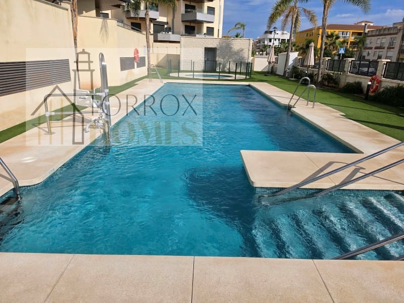Piso de 2 habitaciones en Torrox-Costa en venta con piscina garaje - 395.000 € (Ref: 10166931)