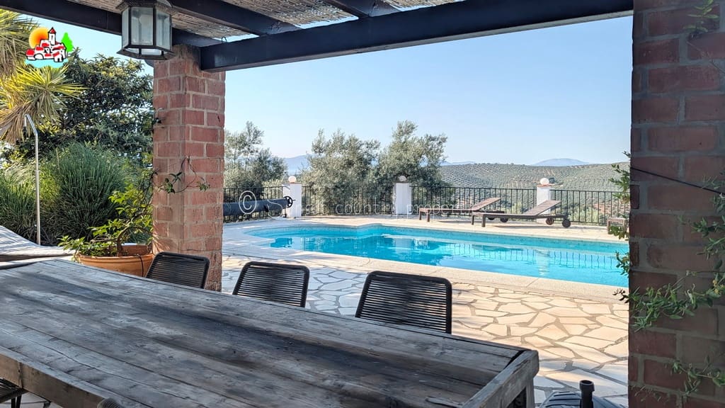 4 sypialnia Finka/Dom wiejski na sprzedaż w Iznajar z basenem garażem - 375 000 € (Ref: 10033314)