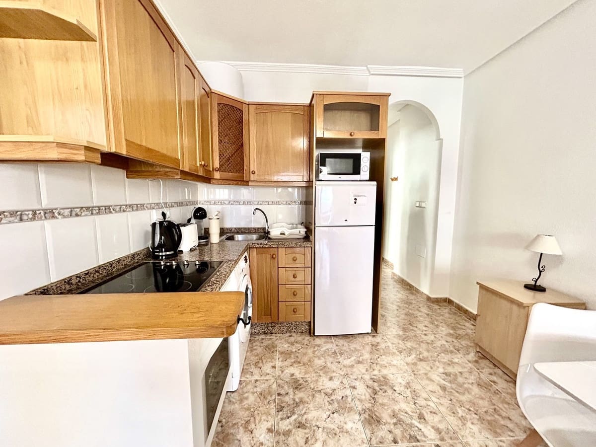2 soveværelse Lejlighed til salg i Cabo Roig med swimmingpool garage - € 230.000 (Ref: 9959039)