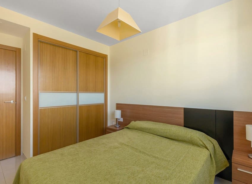 Ático de 2 habitaciones en Punta Prima en venta con piscina garaje - 699.000 € (Ref: 9902074)