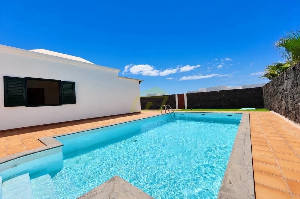 4 chambre Villa/Maison à vendre à Playa Blanca avec piscine - 465 000 € (Ref: 10034850)