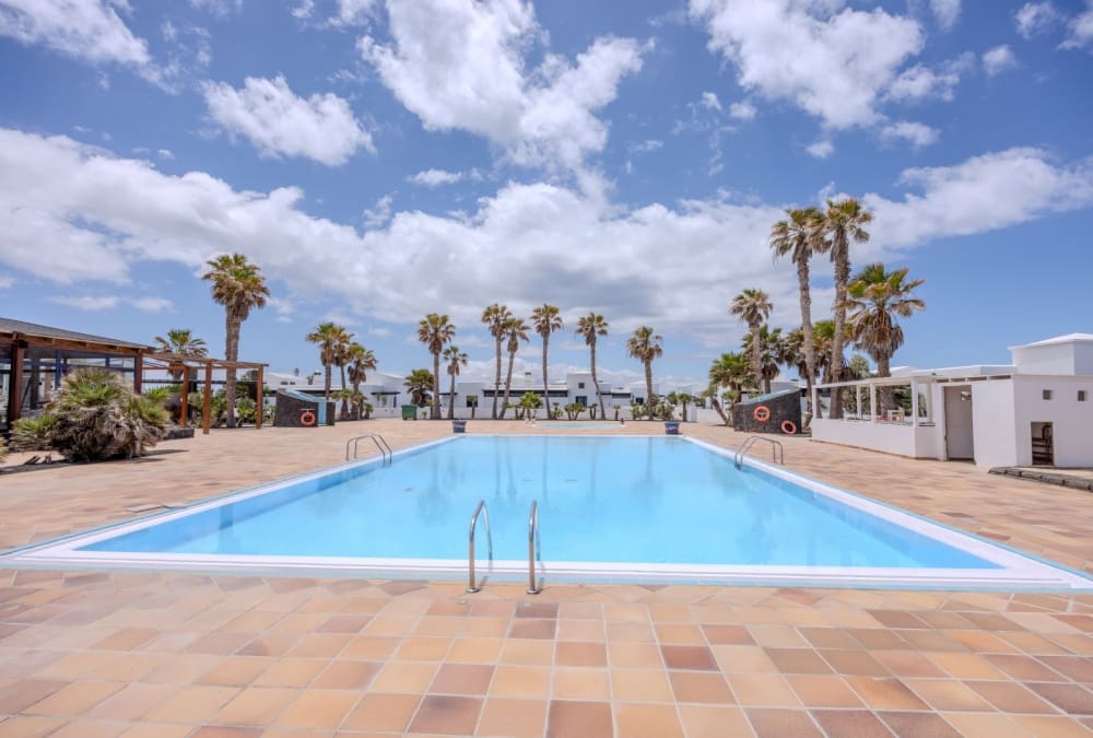 2 sovrum Bungalow till salu i Playa Blanca med pool - 425 000 € (Ref: 9458481)