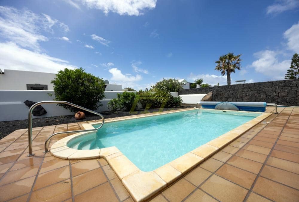 2 sypialnia Willa na sprzedaż w Playa Blanca z basenem garażem - 498 000 € (Ref: 9777606)